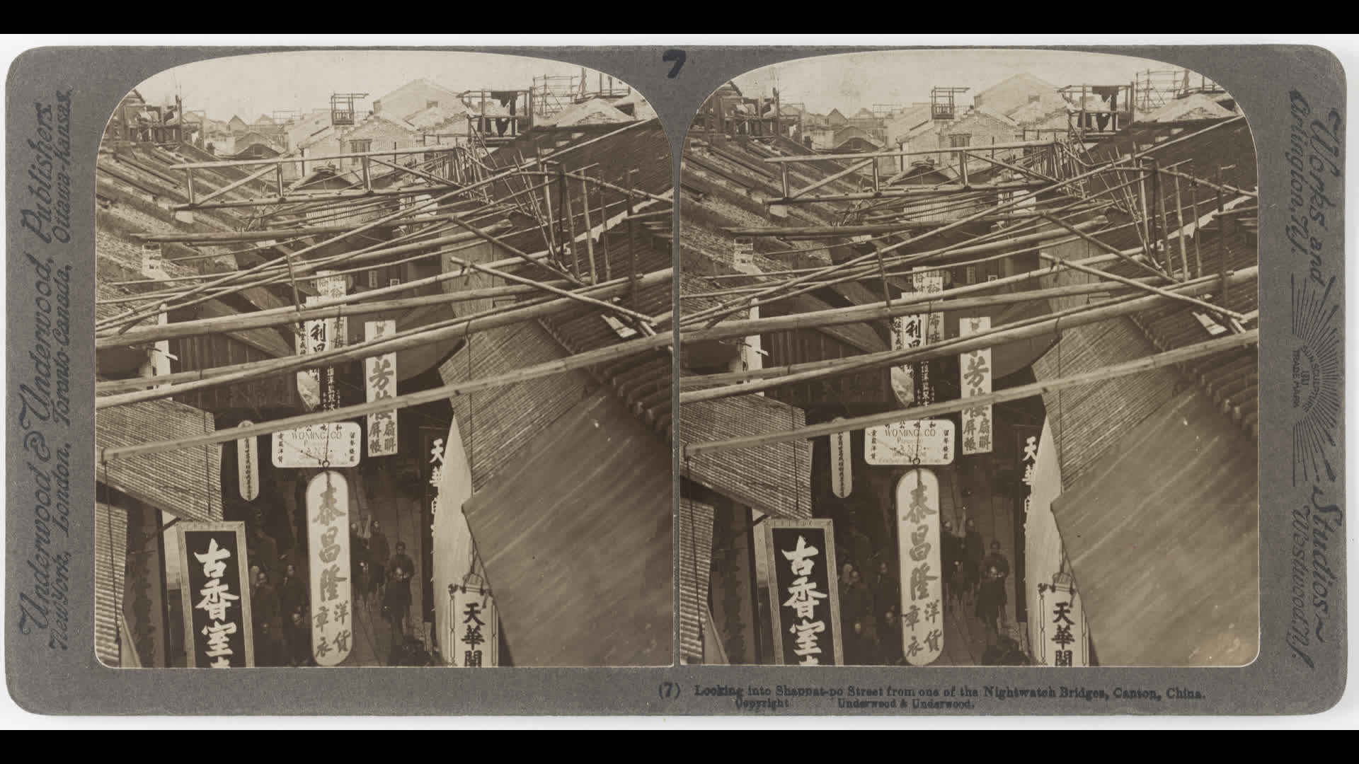 Looking into Shappat-Po Street from one of the Nightwatch Bridges, Canton, China